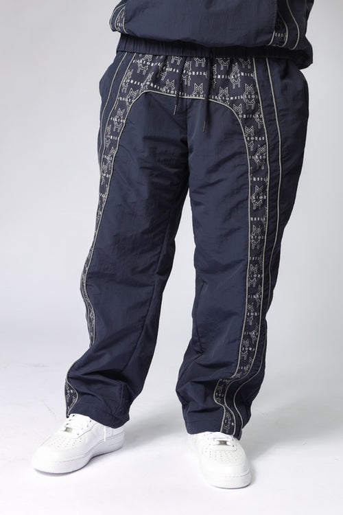 MCMILLIONS MONOGRAM WINDBREAKER PANTS