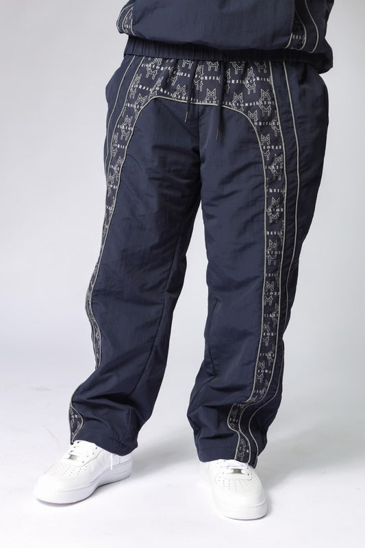 MCMILLIONS MONOGRAM WINDBREAKER PANTS