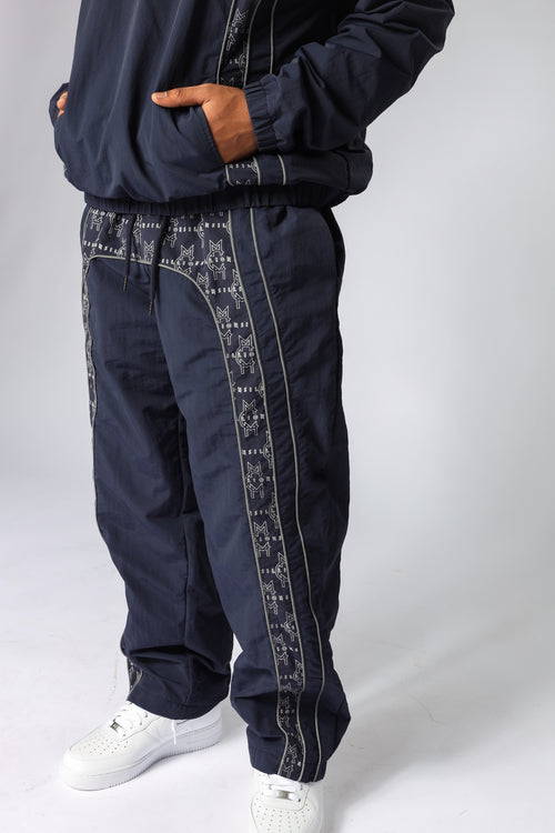 MCMILLIONS MONOGRAM WINDBREAKER PANTS